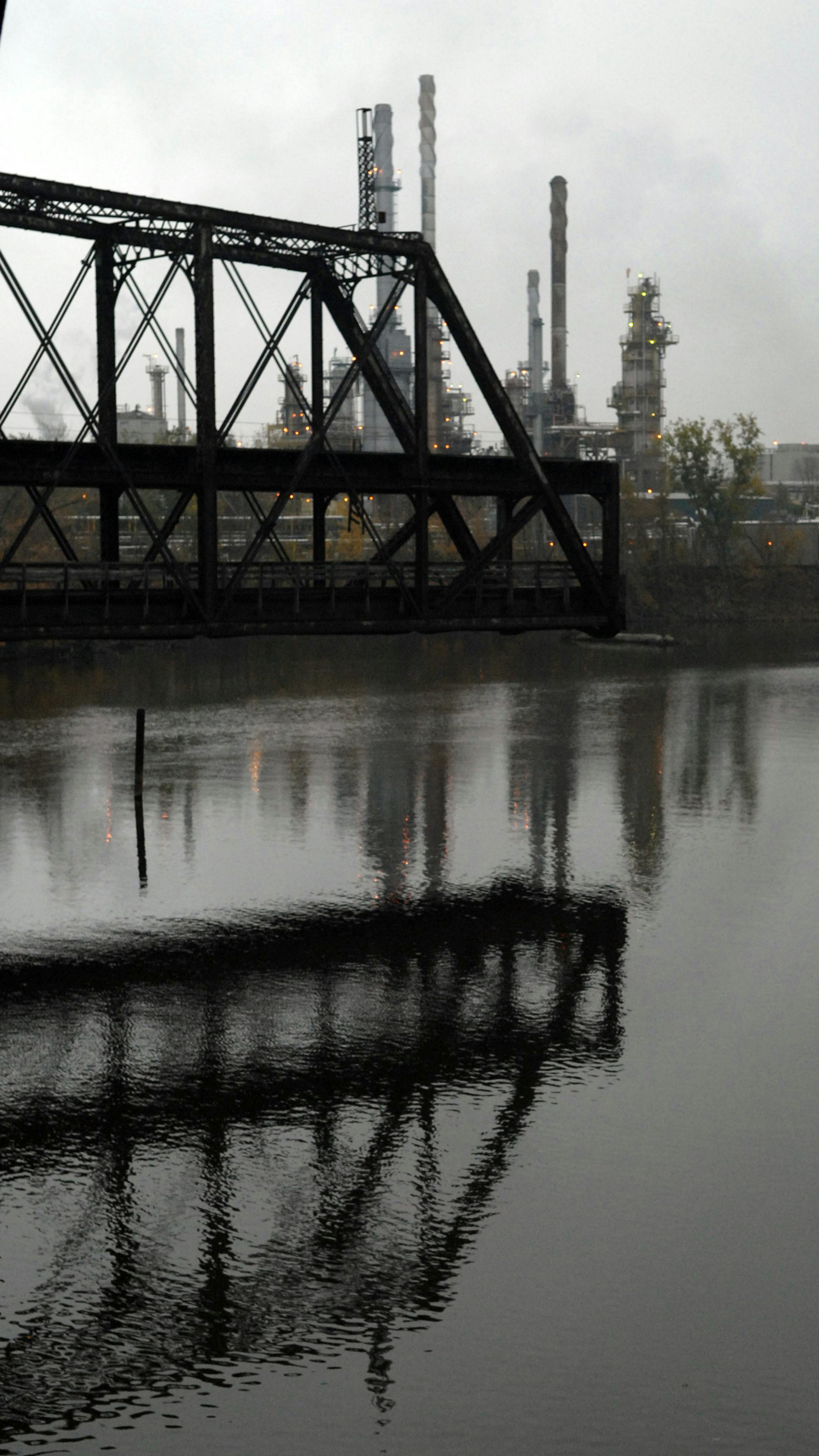 In this picture: Rock Island Swing Bridge frames the oil refinery across the Mississippi River History buffs will have a chance to tour the west portion of the Rock Island Swing Bridge on Saturday. National Park Service rangers will lead tours to talk about the bridge, used by gangster John Dillinger to elude cops in the 1930s. The bridge has been closed for years, but Dakota County and the city of Inver Grove Heights have some ideas on how to save it as a pedestrian walkway or interpretive disp