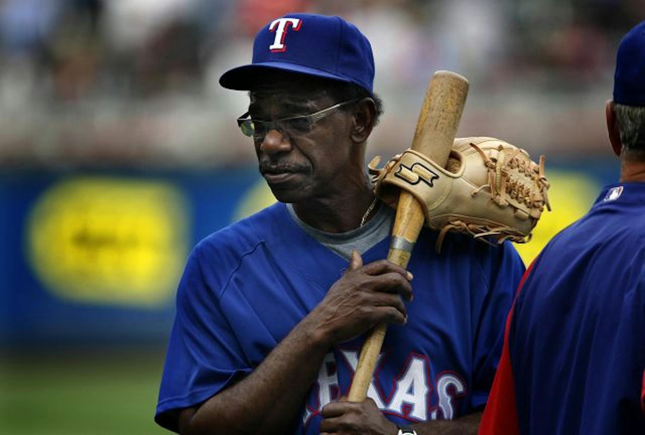 Texas manager Ron Washington left the field after pitching batting practice.