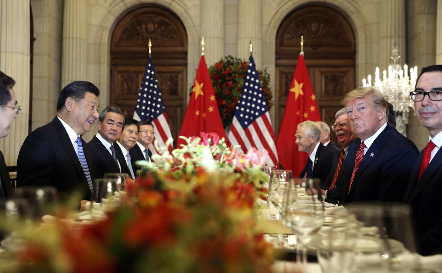 FILE - In this Dec. 1, 2018, file photo, U.S. President Donald Trump, second right, and China's President Xi Jinping, second left, attend their bilateral meeting at the G20 Summit in Buenos Aires, Argentina. A U.S.-Chinese cease fire on tariffs gives jittery companies a respite but does little to resolve a war over Beijing's technology ambitions that threatens to chill global economic growth. (AP Photo/Pablo Martinez Monsivais, File)