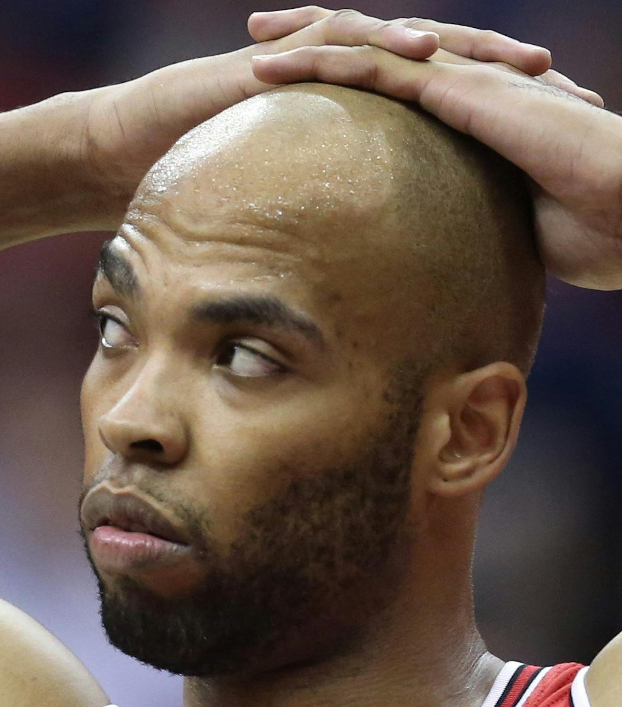 Chicago Bulls forward Taj Gibson (22) shows frustration near the end of their game against the Washington Wizards in their first round playoff game played at the Verizon Center in Washington, Sunday, Apr. 27, 2014. Washington defeated Chicago 98-89 to take a 3-1 lead in the series. (Brian Cassella/Chicago Tribune/MCT) ORG XMIT: 1152227