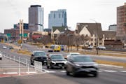 Cars travel along Olson Highway near the Van White Memorial Boulevard intersection in Minneapolis' Sumner-Glenwood neighborhood on March 21. A mission