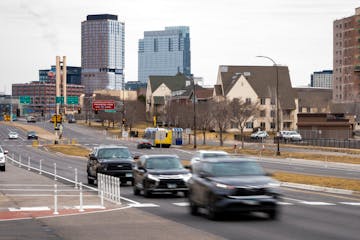 Cars travel along Olson Highway near the Van White Memorial Boulevard intersection in Minneapolis' Sumner-Glenwood neighborhood on March 21. A mission