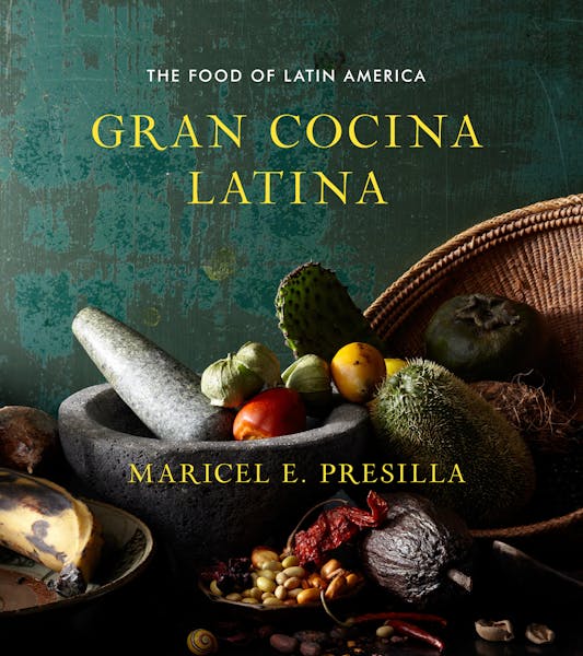 This undated publicity photo provided by W.W. Norton shows the cover of Cuban-born chef Maricel E. Presilla's cookbook, "Gran Cocina Latina." The Jame