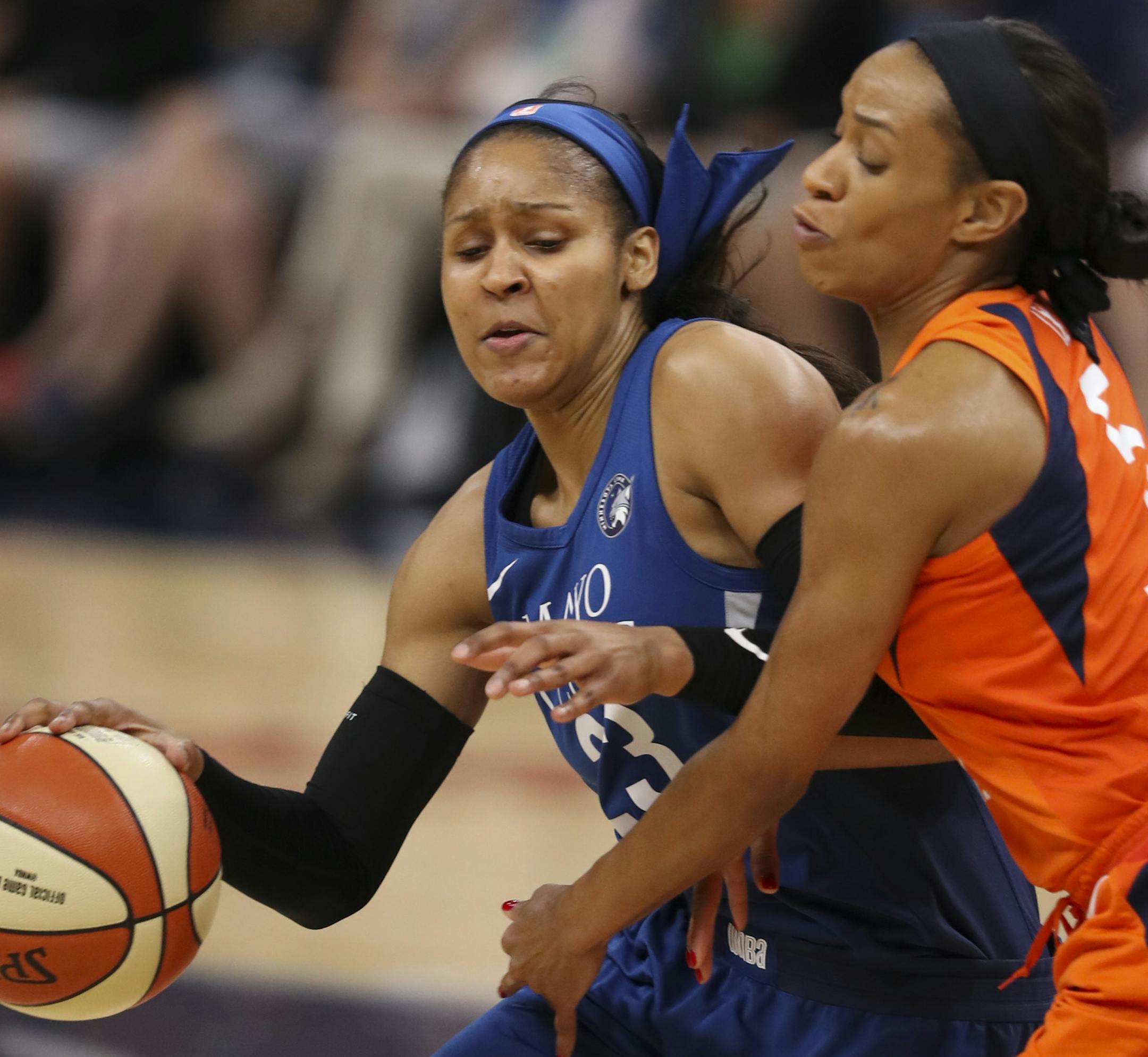 Minnesota Lynx forward Maya Moore (23) tried to drive around Connecticut Sun guard Jasmine Thomas (5) in the first quarter. ] JEFF WHEELER ï jeff.wheeler@startribune.com The Minnesota Lynx faced the Connecticut Sun in an WNBA game Sunday night, July 15, 2018 at Target Center in Minneapolis.
