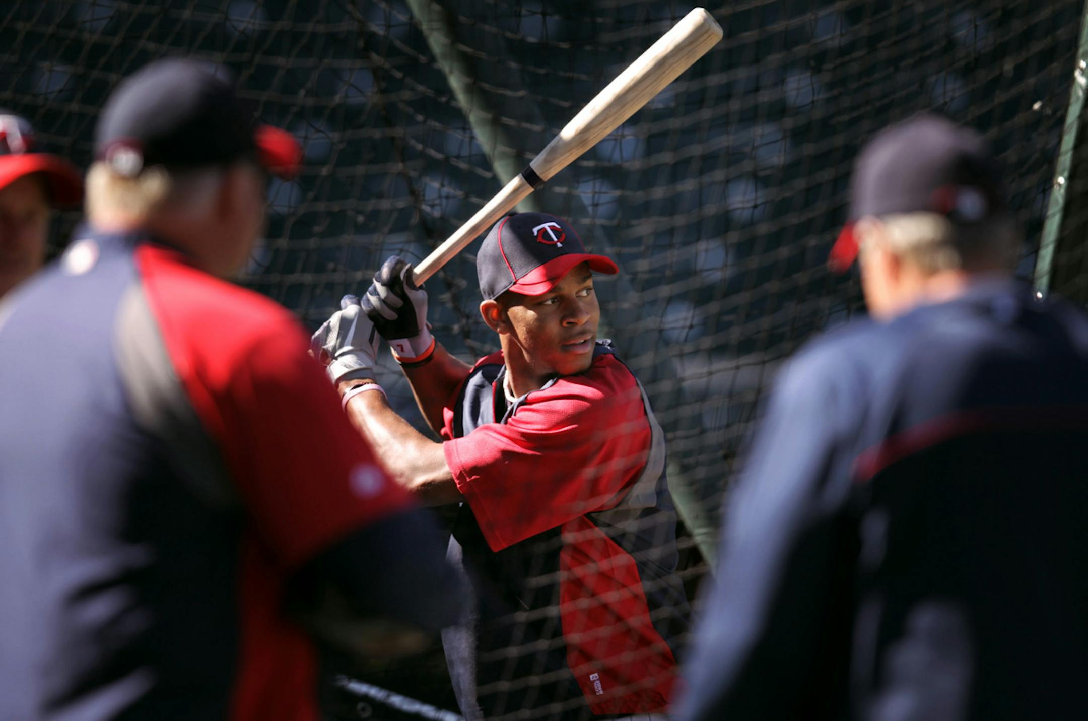 Twins first round draft pick Byron Buxton chatted with manger Ron Gardenhire and hitting coach Joe Vara during batting practice before the game with the Philadelphia Phillies June 12, 2012 in Minneapolis, MN.] (Jerry Holt/ STAR TRIBUNE/