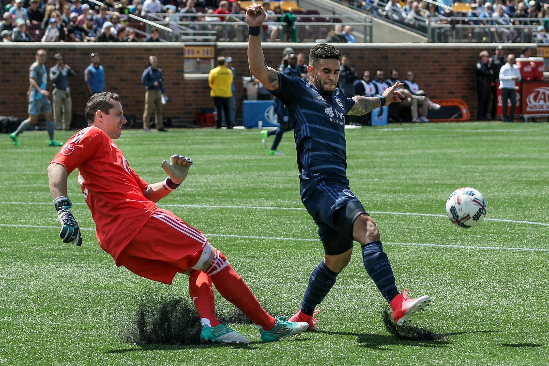 Sporting Kansas City forward Dom Dwyer, right, attempted to block a kick by Minnesota United goalkeeper Bobby Shuttleworth on Sunday. Shuttleworth didn&#x2019;t miss a minute or a save, despite suffering a bloody nose after a kick to the face.