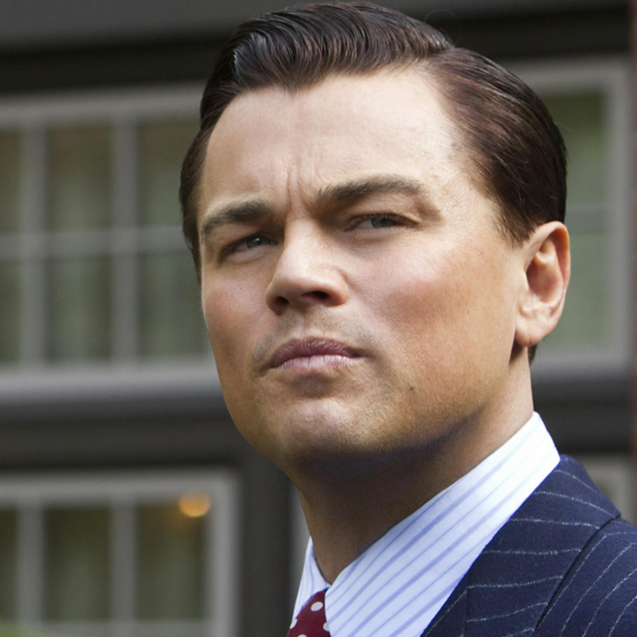 In an undated handout photo, Leonardo DiCaprio as the founder of Stratton Oakmont, Jordan Belfort, in "The Wolf of Wall Street." The upcoming movie, recounting Belfort's debauched lifestyle while running the corrupt brokerage, has reopened old wounds among many who were victimized by Stratton's boiler-room sales tactics and penny-stock scams. (Mary Cybulski/Paramount Pictures via The New York Times) -- NO SALES; FOR EDITORIAL USE ONLY WITH STORY SLUGGED WOLF SWINDLE VICTIMS BY ANTILLA. ALL OTHER