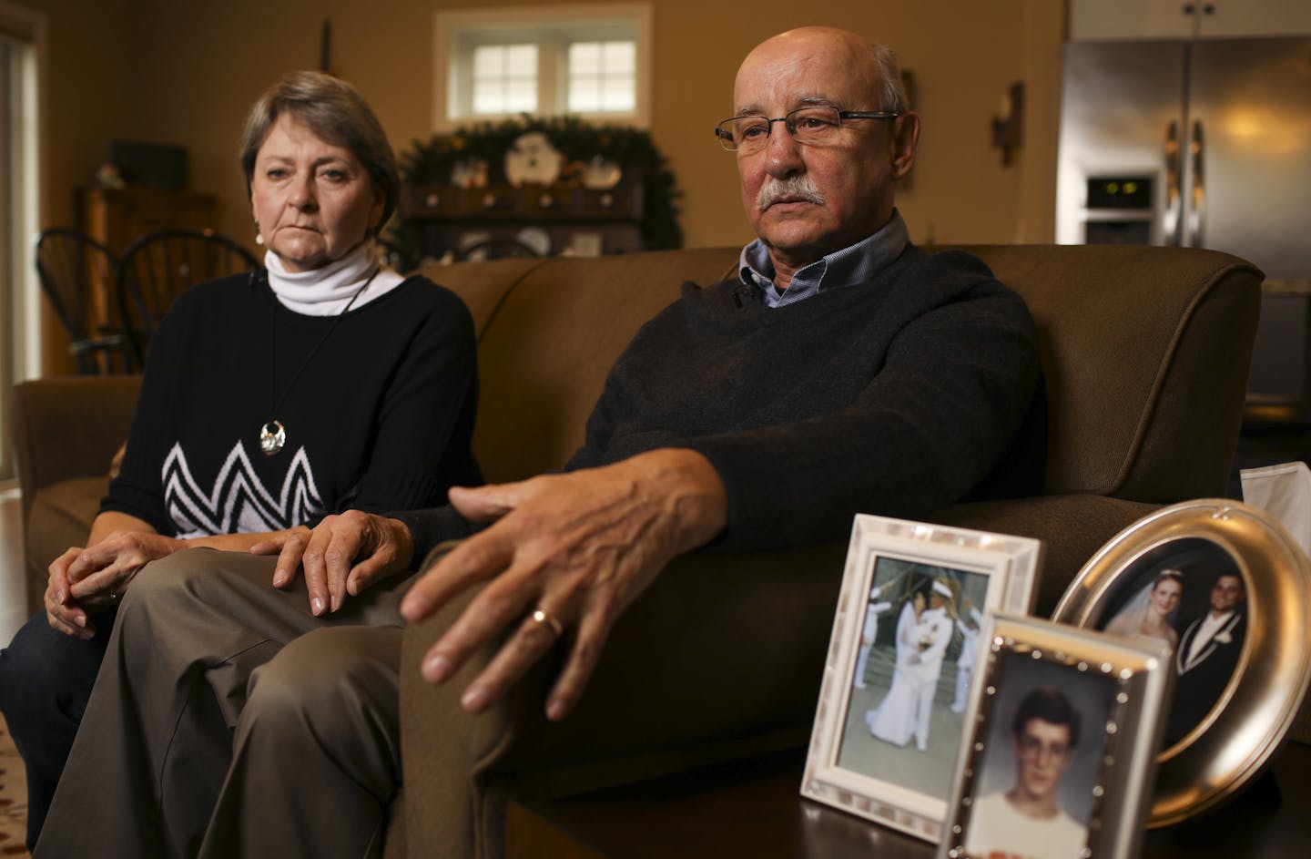 Loni and Jim Kerze spoke about their son, Chris, during an interview in their Woodbury home Monday afternoon. A portrait of Chris is in the frame at lower right.