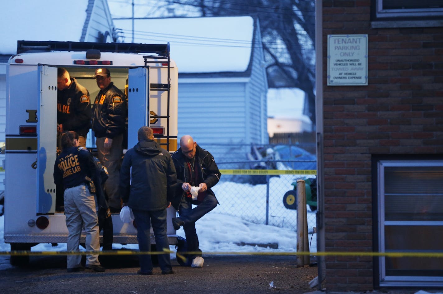 In the Frogtown neighborhood of St. Paul, police investigated the scene at an apartment on Victoria Ave. where three people were found dead.