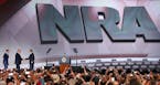Thousands of NRA members snap photos as Executive Director of the NRA Wayne LaPierre, right, and Executive Director of the NRA Institute for Legislati