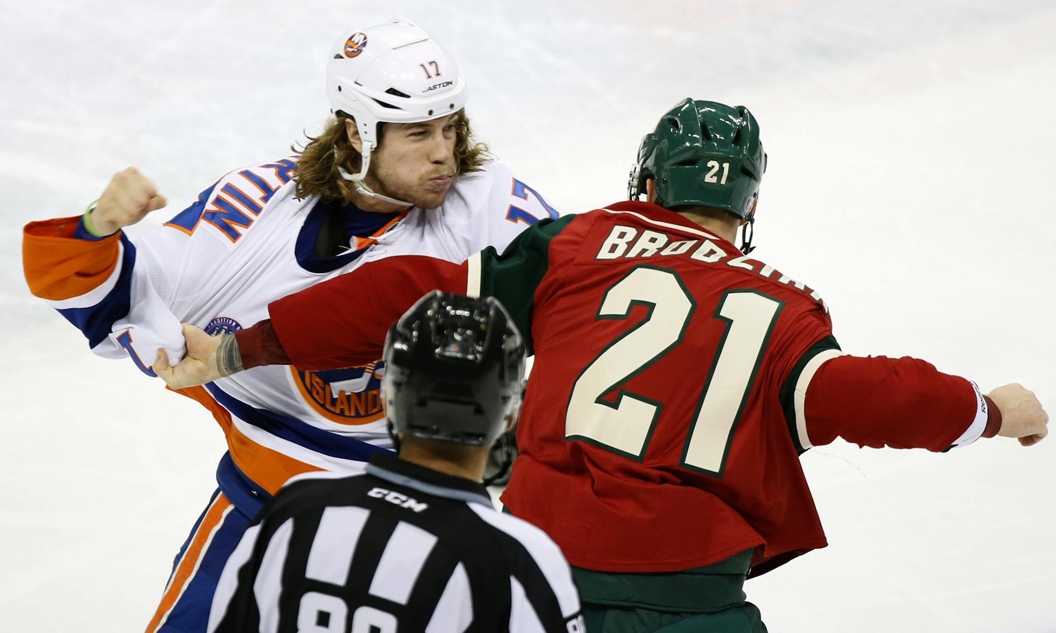 Matt Martin(17) and Kyle Brodziak(21) got in a fight.] in the Wild game at the Xcel Center against the New York Islanders.Richard Tsong-Taatarii/ rtsong- taatarii@startribune.com