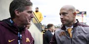 Gophers coach P.J. Fleck shook hands with Athletic Director Mark Coyle following a win over Illinois last season.