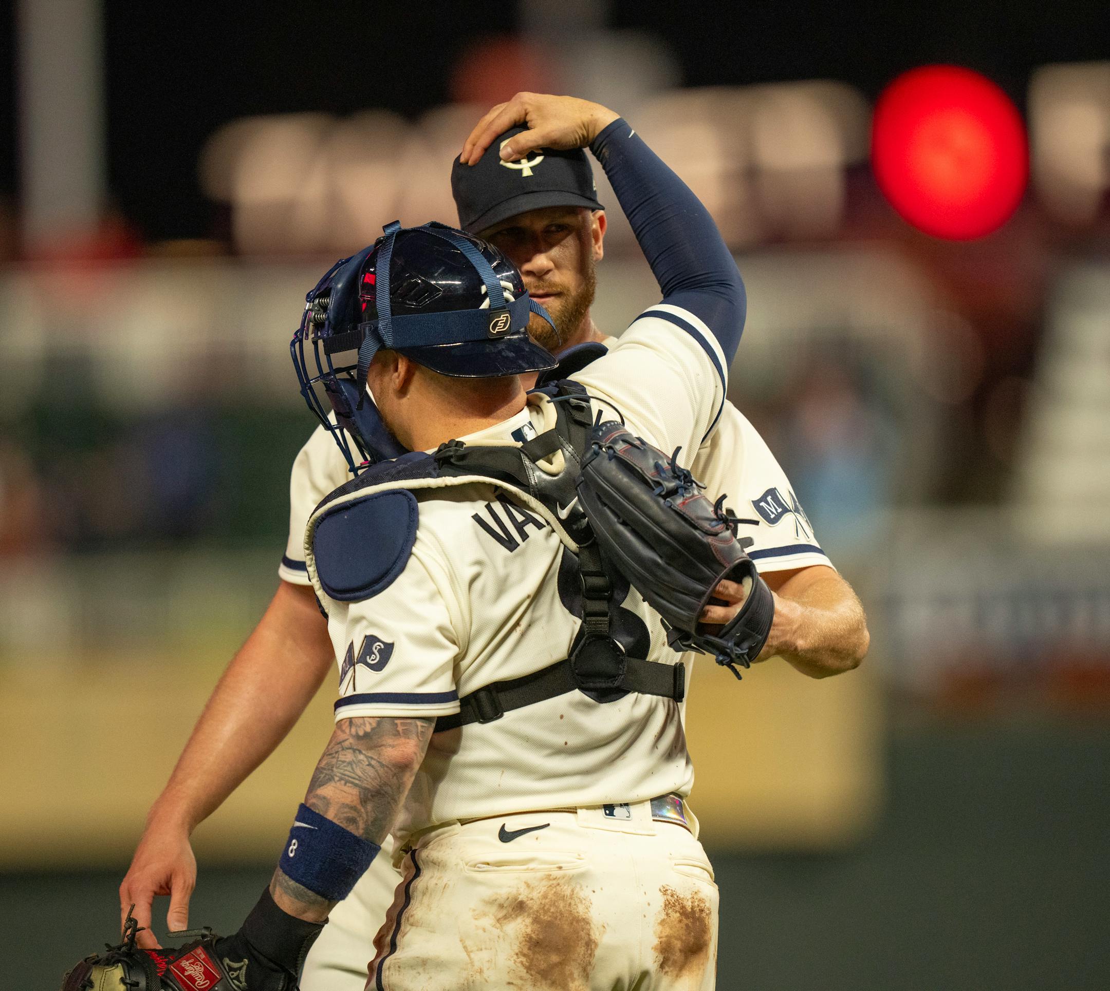 Minnesota Twins relief pitcher Brock Stewart and Minnesota Twins catcher Christian Vazquez congratulated each other after the Twins win. The Minnesota Twins defeated the Oakland Athletics 11-3 in an MLB baseball game Tuesday night, September 26, 2023 at Target Field in Minneapolis. ] JEFF WHEELER • jeff.wheeler@startribune.com