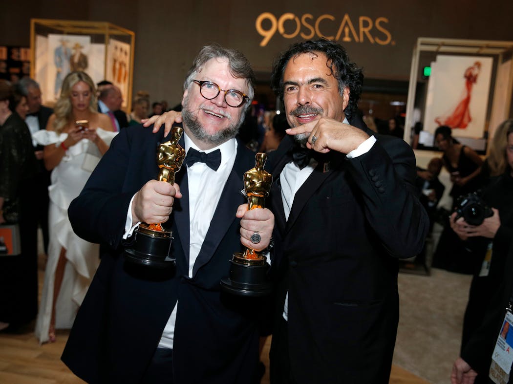 Guillermo del Toro and Alejandro Gonzalez Inarritu celebrated after the Oscars on Sunday, March 4, 2018, at the Dolby Theatre in Los Angeles.