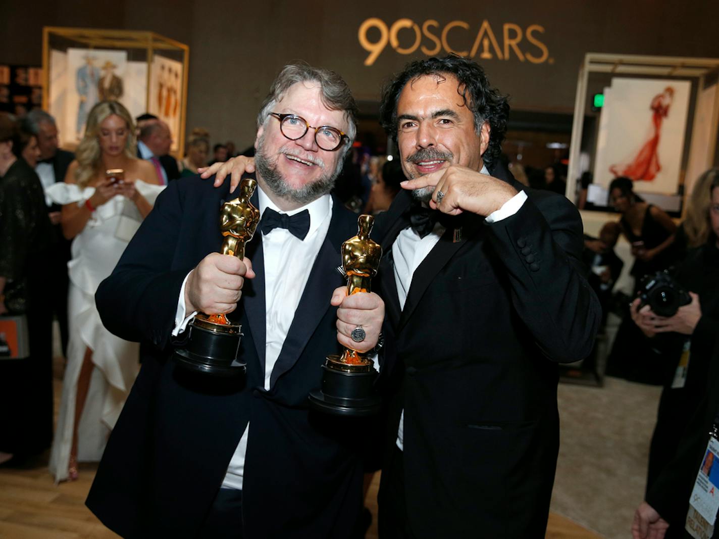 Guillermo del Toro, left, and Alejandro Gonzalez Inarritu attend the Governors Ball after the Oscars on Sunday, March 4, 2018, at the Dolby Theatre in Los Angeles. (Photo by Eric Jamison/Invision/AP) ORG XMIT: INVW