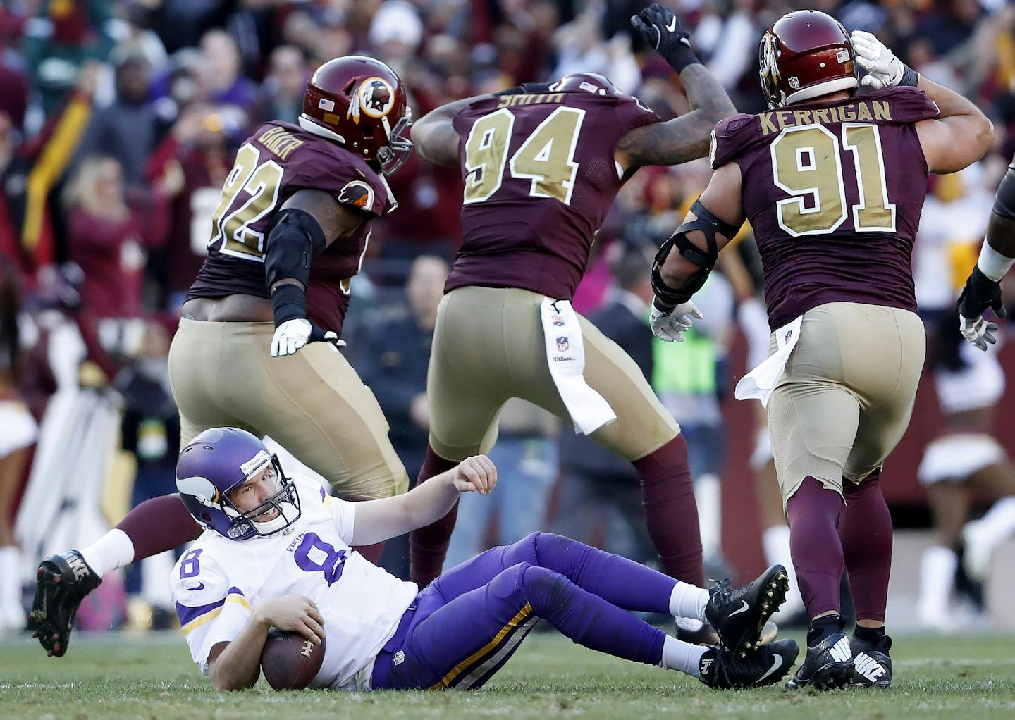 Preston Smith (94) celebrated after sacking Sam Bradford for a 14-yard loss late in the fourth quarter. ] CARLOS GONZALEZ cgonzalez@startribune.com - November 13, 2016, Landover, MD, FedEx Field, NFL, Minnesota Vikings vs. Washington Redskins