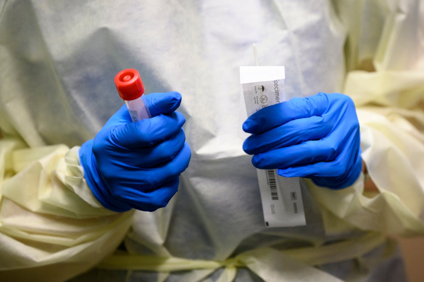 Angie Stransky, a nurse administrator for Mayo Clinic Health System, held a COVID-19 test Tuesday afternoon.