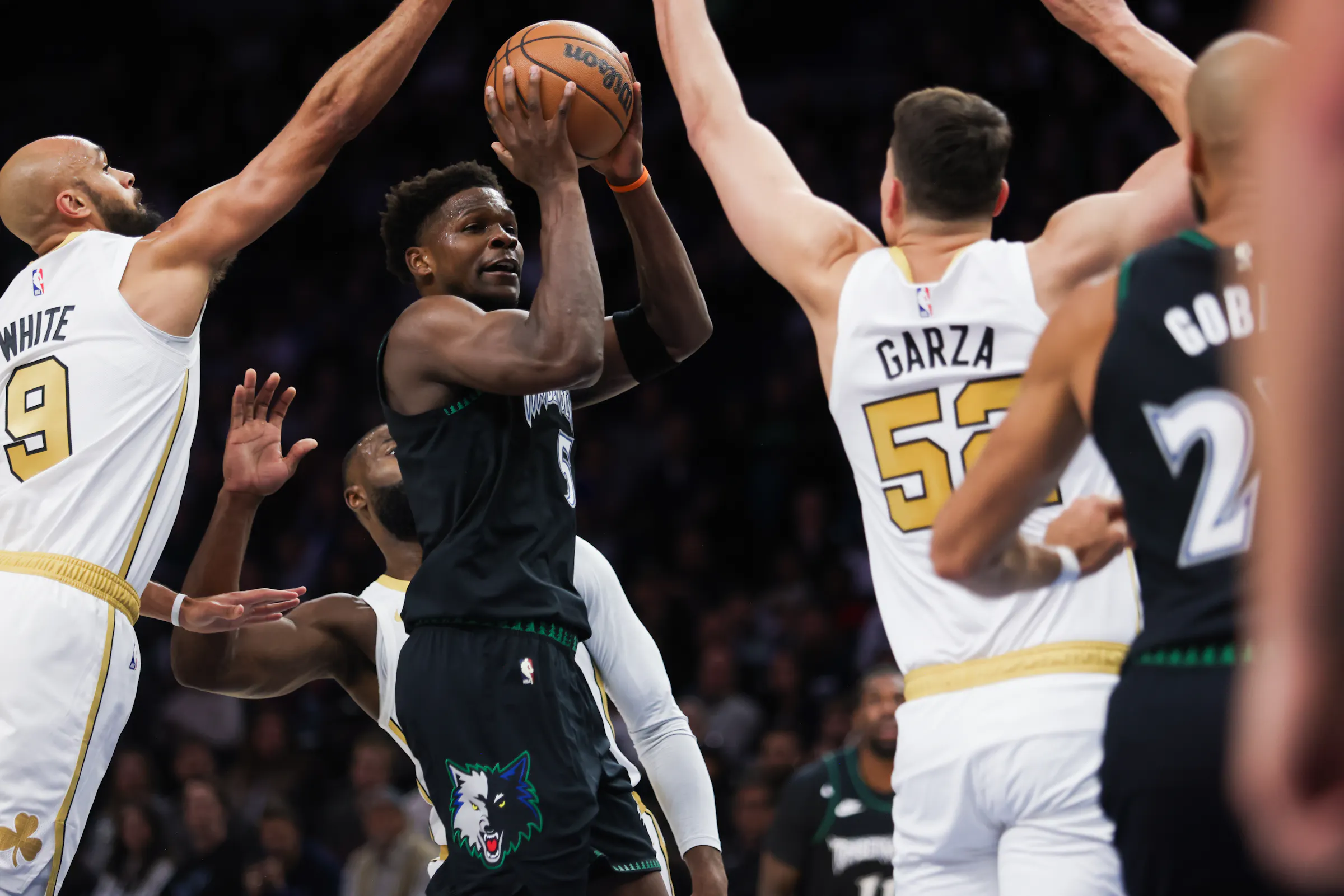 MN Timberwolves hold off Boston Celtics 119-115 to end losing streak
