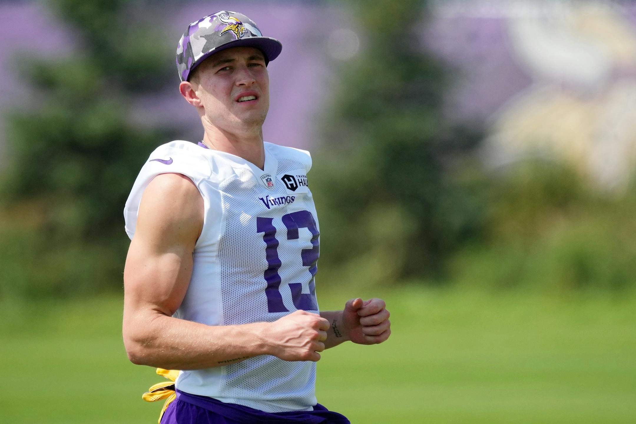 Minnesota Vikings wide receiver Blake Proehl (13) works out during training camp.