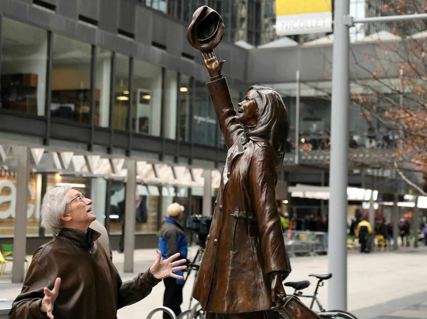 A man stopped to admire the statue of Mary Tyler Moore following a dedication ceremony to mark the opening of the newly renovated Nicollet Mall Thursday. ] ANTHONY SOUFFLE &#xef; anthony.souffle@startribune.com Mayor Betsy Hodges, Steve Cramer and others spoke during a ceremony to mark the reopening of Nicollet Mall Thursday, Nov. 16, 2017 in downtown Minneapolis.