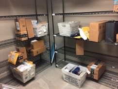 In this April 13, 2018, photo, packages from Internet retailers are delivered with the U.S. Mail in a apartment building mail room in Washington. Clic