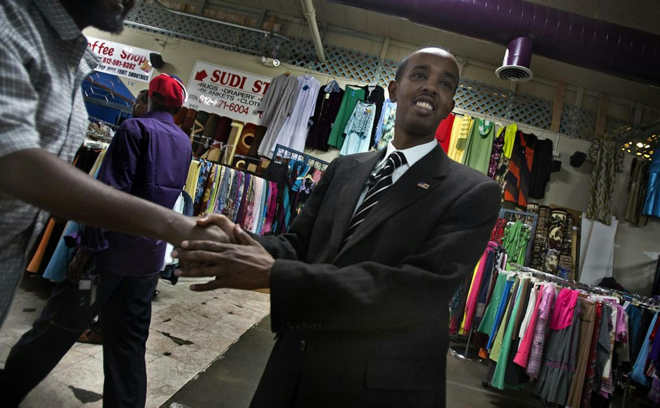 Somali-American community leader Sadik Warfa is a Somali immigrant who has run for several political offices. Warfa has an office in the �24 Mall� (also known as the Village Market).