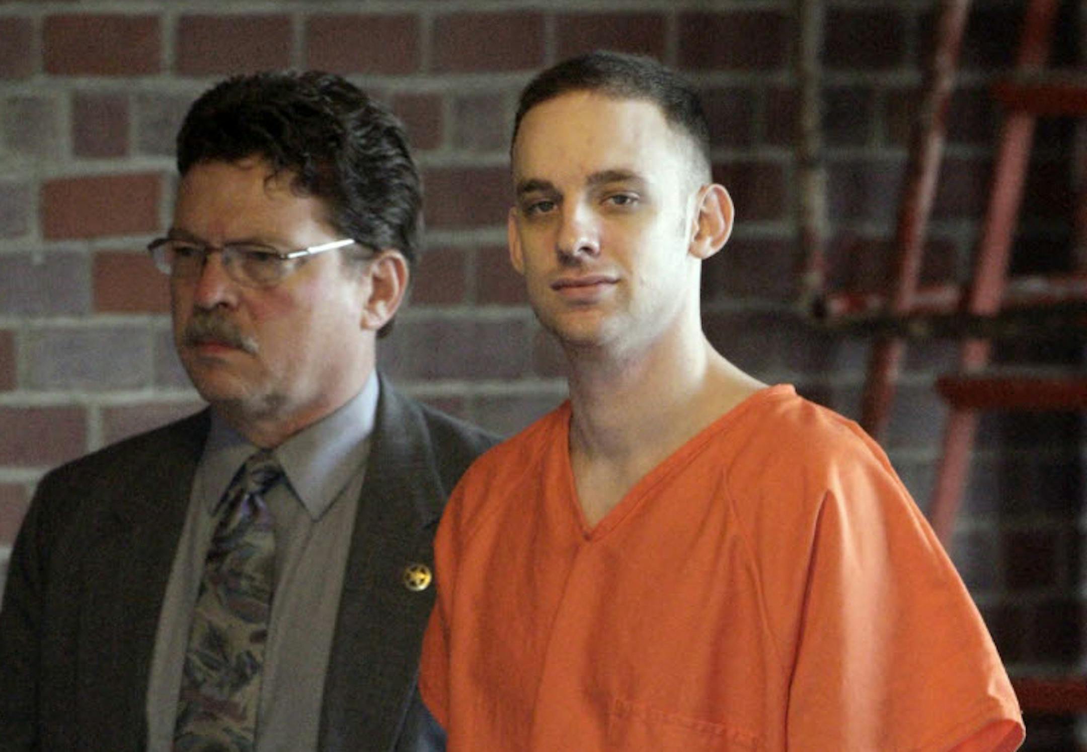 FILE - In this April 29, 2009 file photo, former 101st Airborne Division Pfc. Steven Dale Green is escorted to the courthouse on the third day of his trial in Paducah, Ky.