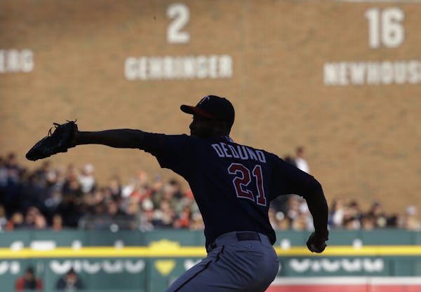 Minnesota Twins starting pitcher Samuel Deduno throws during the second inning of a baseball game against the Detroit Tigers in Detroit, Friday, May 2
