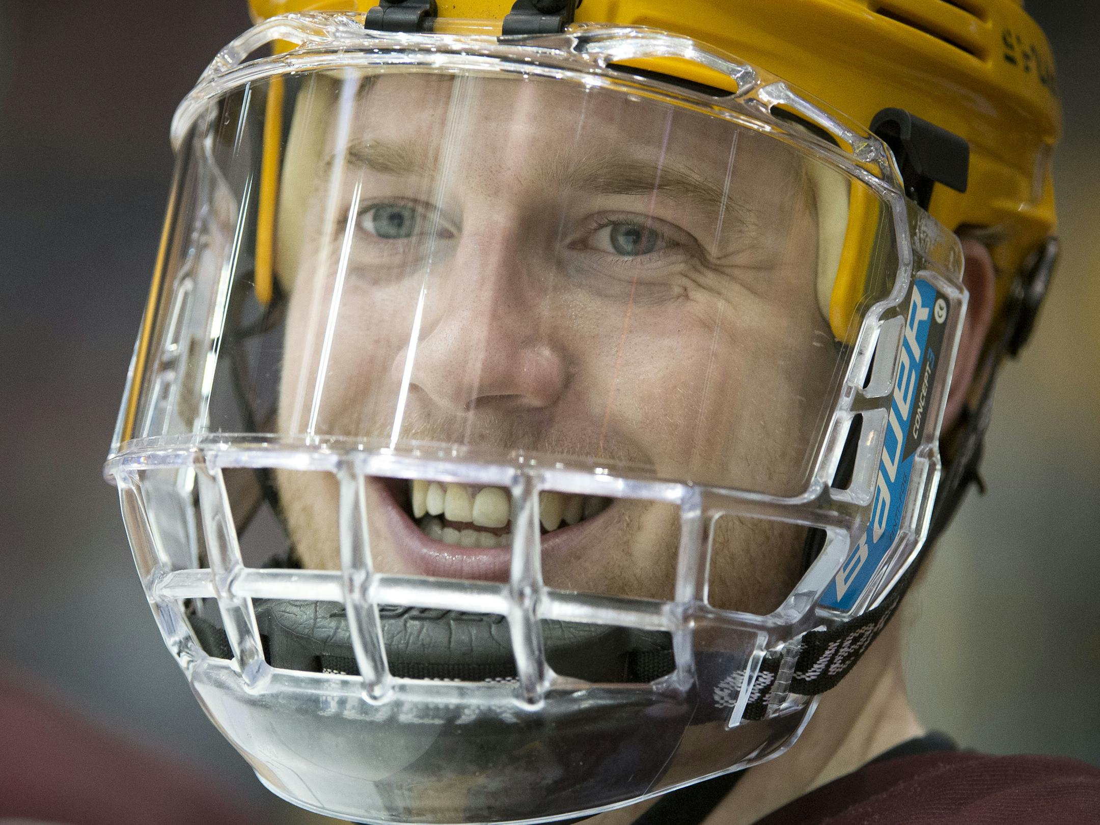 Minnesota center Travis Boyd (22) is all smiles on the bench after scoring 3 goals against Ohio State on Saturday night. ] (Aaron Lavinsky | StarTribune) University of Minnesota men's hockey takes on Ohio State on Saturday, Feb. 7, 2015 at Mariucci Arena.