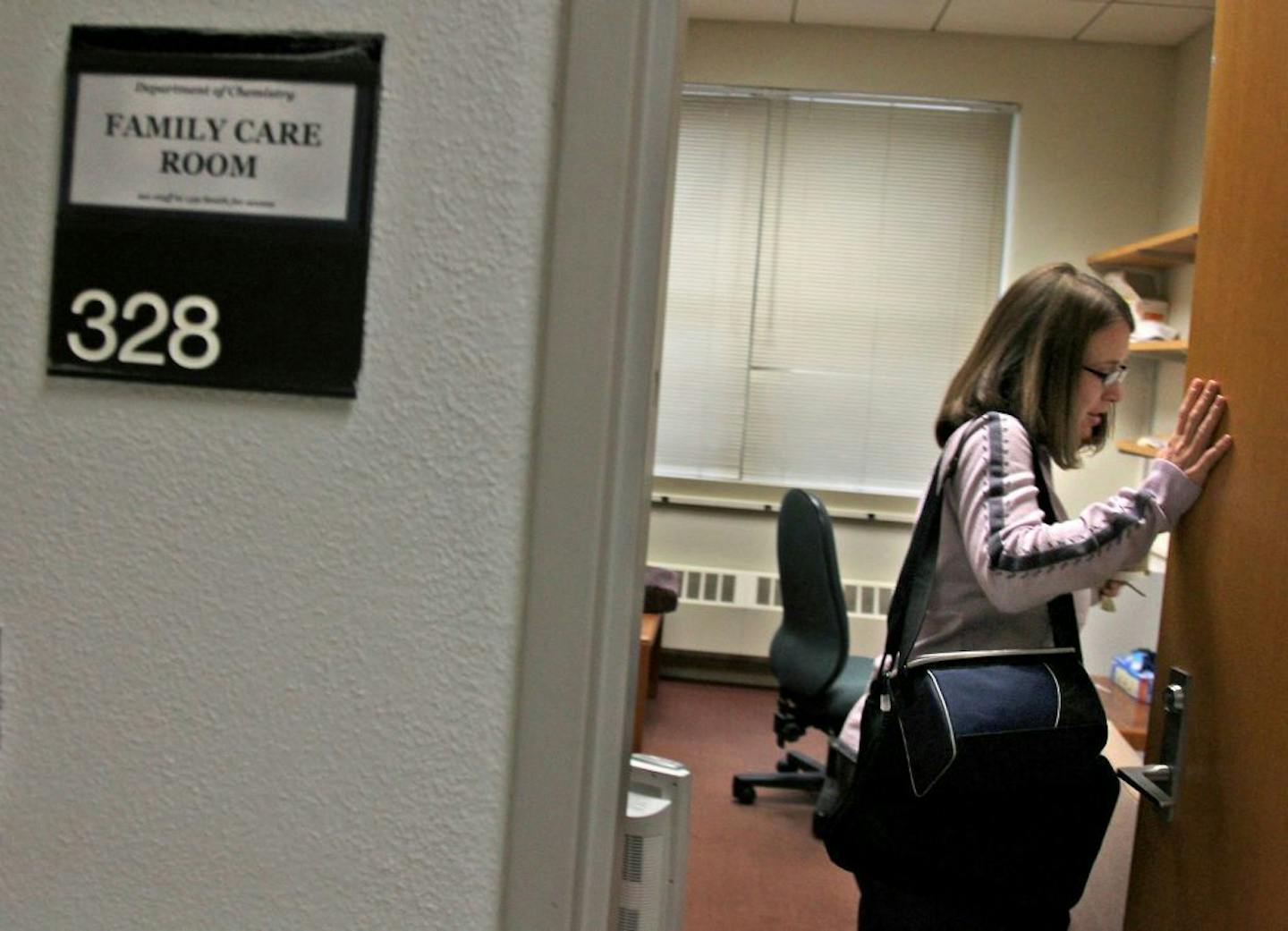 Before teaching a class and a busy day of meetings, Professor Christy Haynes made her way into a family room to pump breast milk, Monday, October 8, 2012. (ELIZABETH FLORES/STAR TRIBUNE) ELIZABETH FLORES � eflores@startribune.com