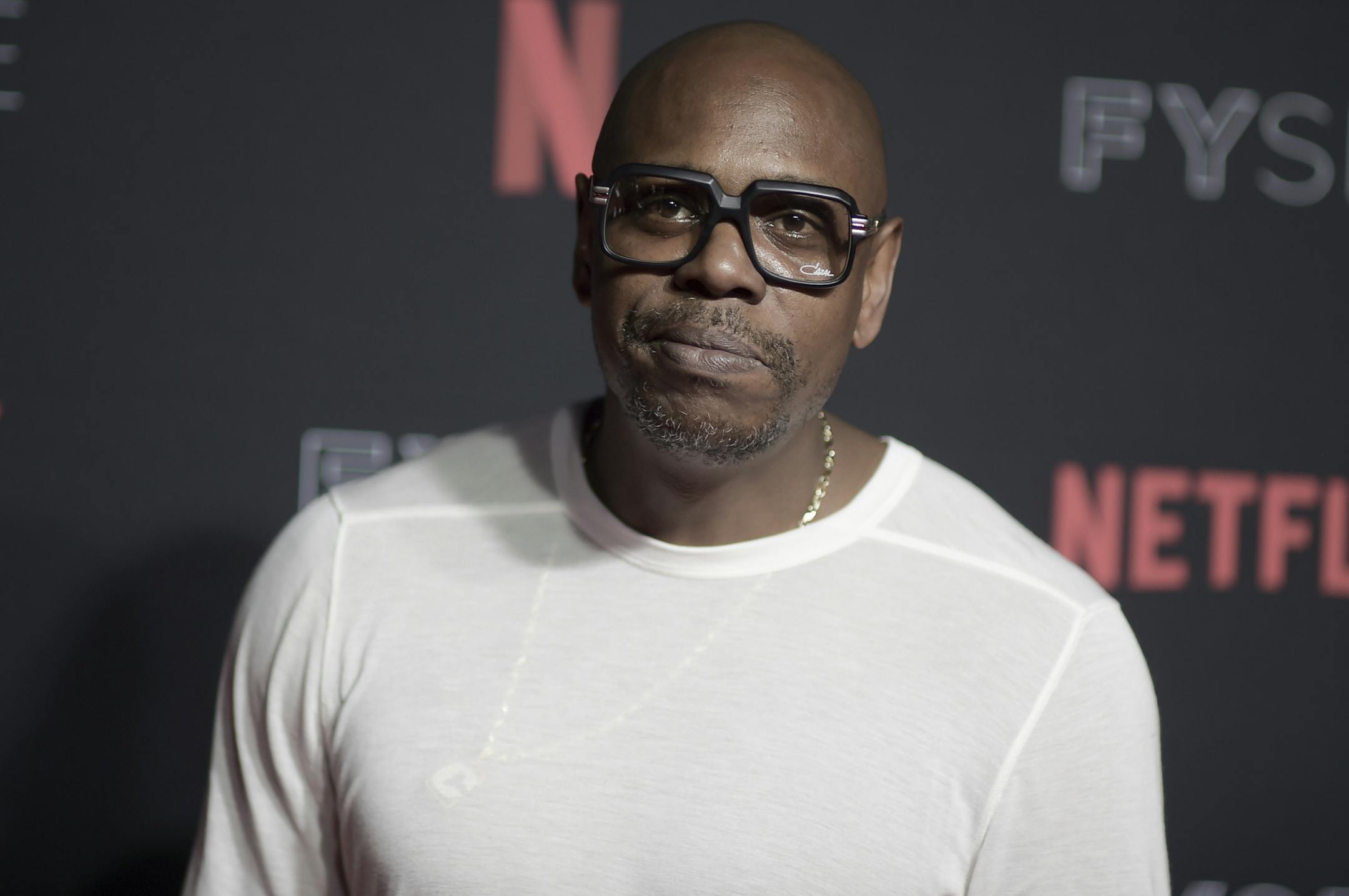 FILE - in this May 6, 2018, file photo, Dave Chappelle attends the 2018 Netflix FYSee Kick-Off Event at Raleigh Studios Hollywood in Los Angeles. Chappelle has been chosen to receive this year's Mark Twain Prize for American Humor. The 45-year-old Chappelle shot to international stardom through his program "Chappelle's Show," which gleefully skewered racial stereotypes and hot-button societal issues. (Photo by Richard Shotwell/Invision/AP)