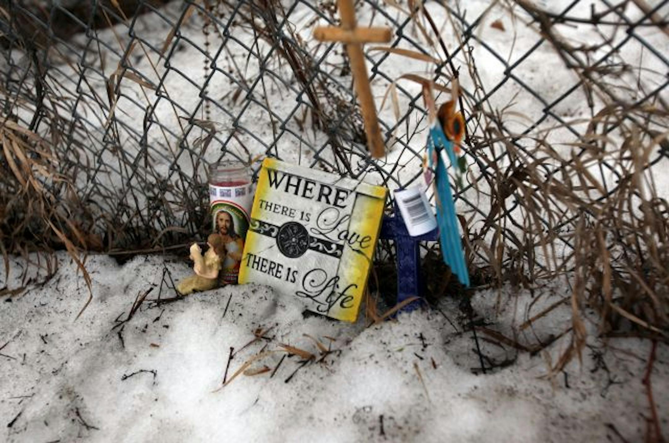 Balloons, messages and toys have gathered at the spot in Burnsville where 6-year-old Kallie Palmer climbed over before running onto the freeway and being struck by an SUV.