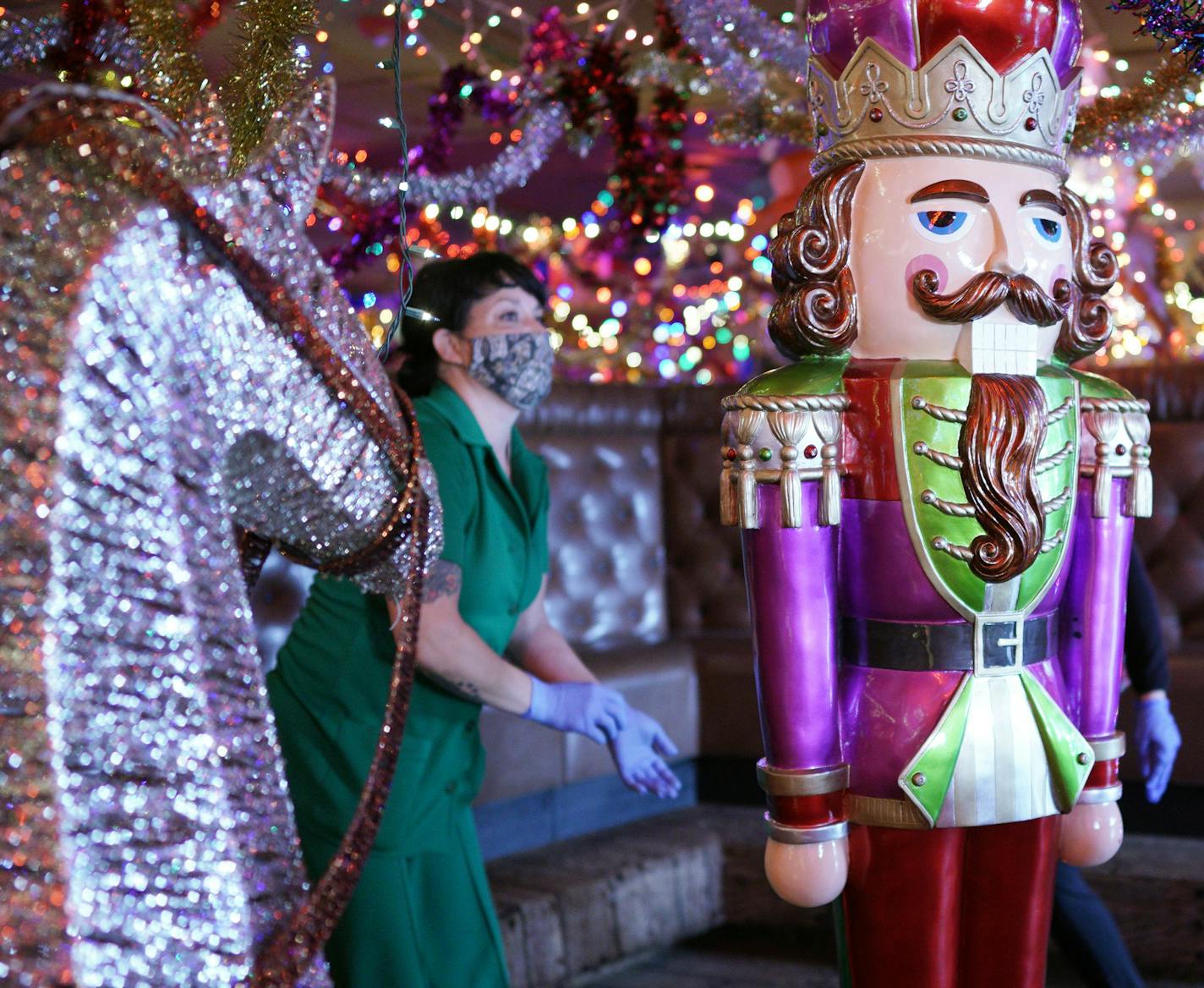 The transformation of Psycho Suzi's into Mary's Christmas Palace, an over-the-top holiday-themed bar in North East Minneapolis. Here, Ty Omeara helps decorate every inch of the bar. brian.peterson@startribune.com Minneapolis, MN Wednesday, September 30, 2020