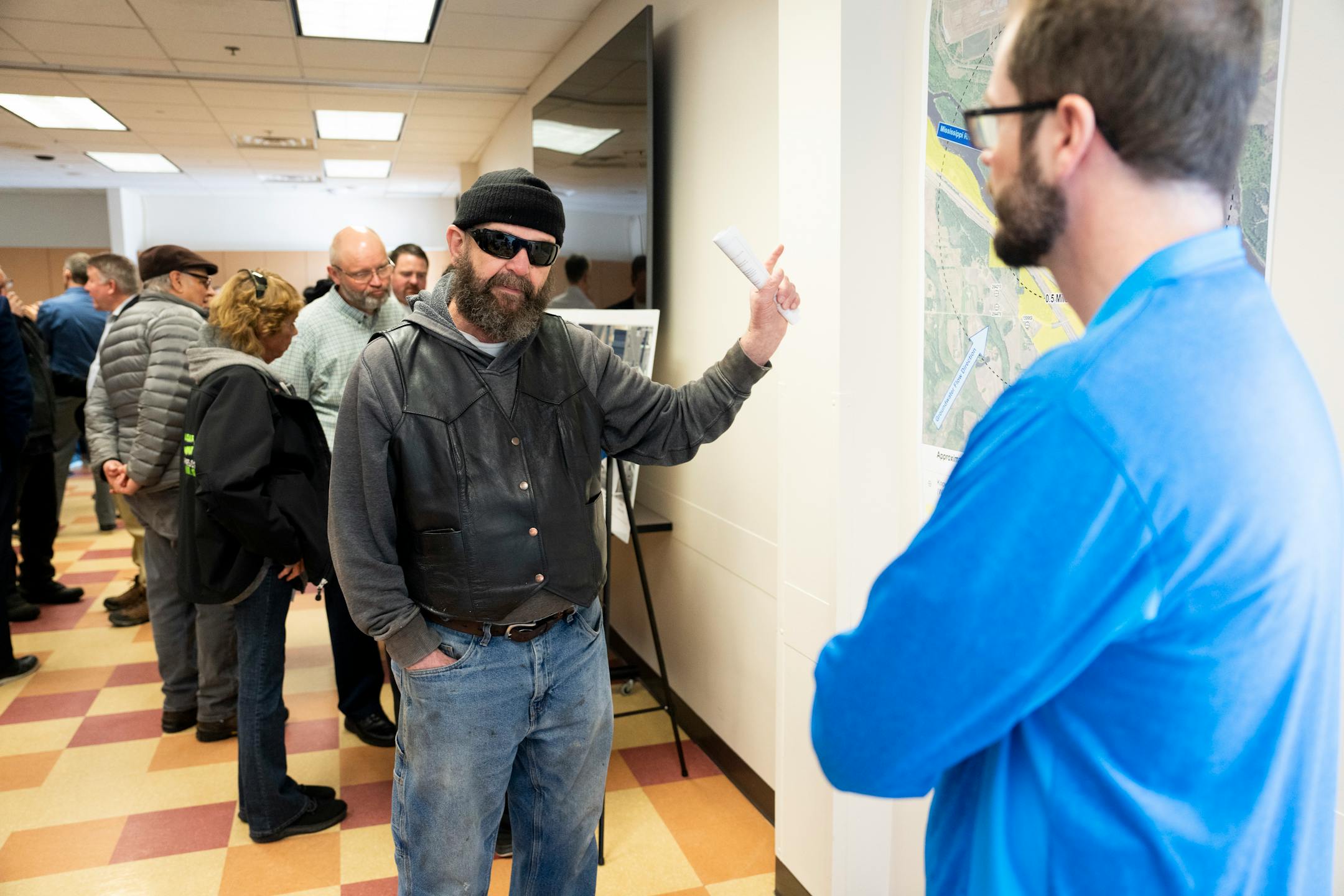 Wally Hauan, who lives along the Mississippi River next to the nuclear power plant, asked questions after his safety and the safety of animals to Trent Farnum of the Minnesota Department of Health.