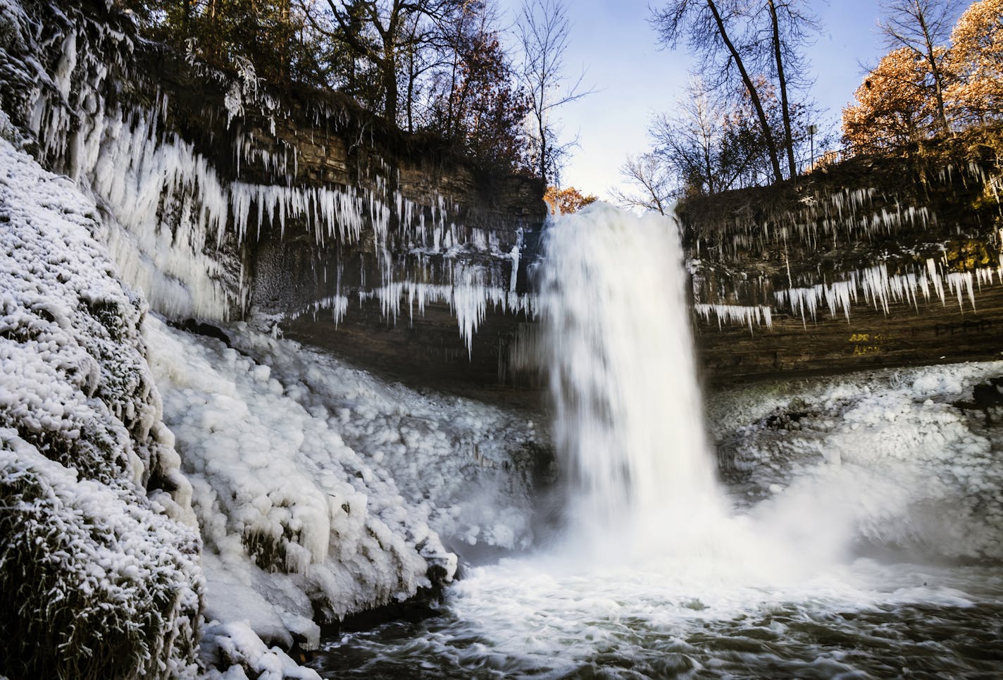 An icy spray began to coat the sides Minnehaha Falls with snow and ice on Monday, Nov. 11, due to the low temperatures.