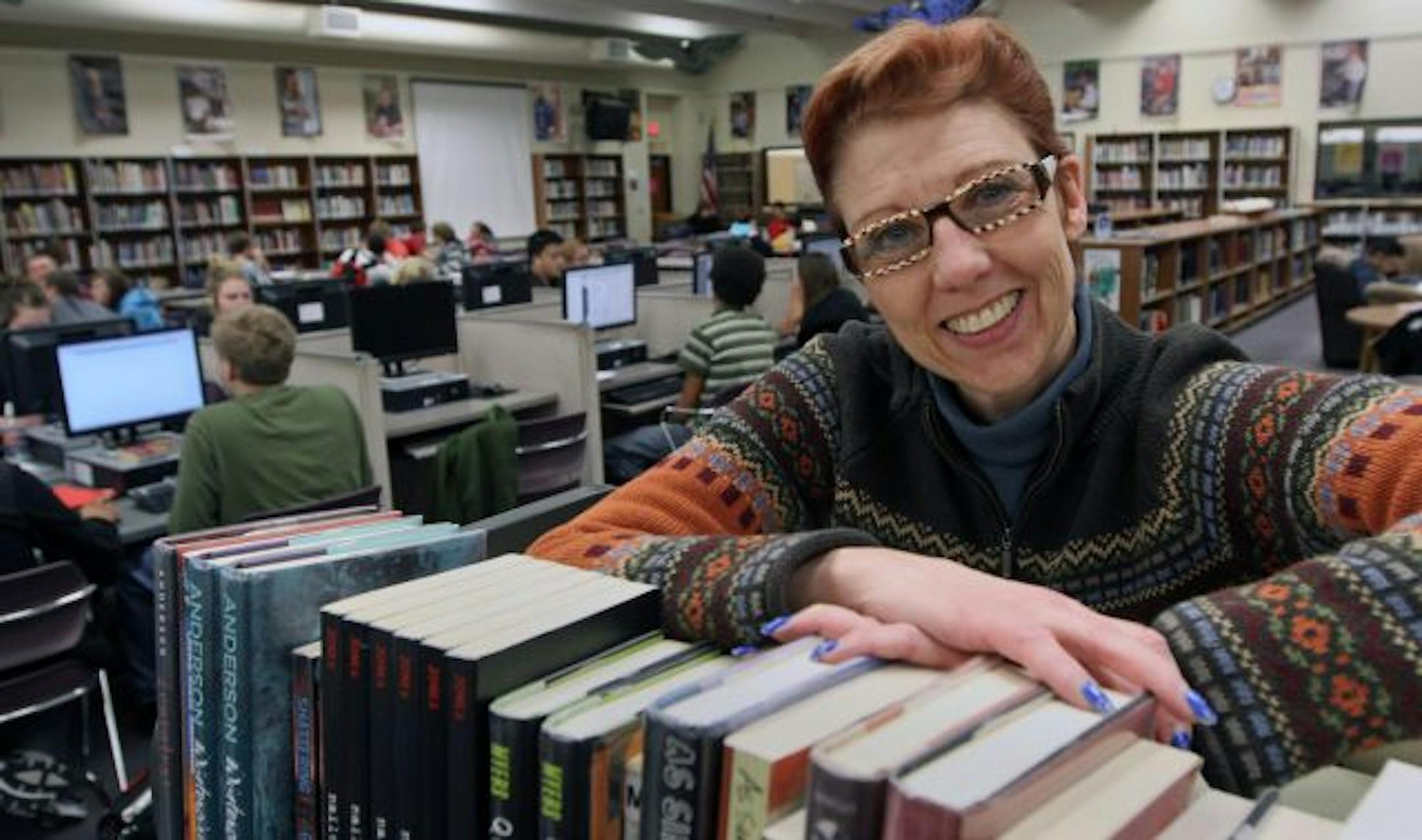 (left to right) Spring Lake Park High School Librarian Tori Jensen in the schools library.