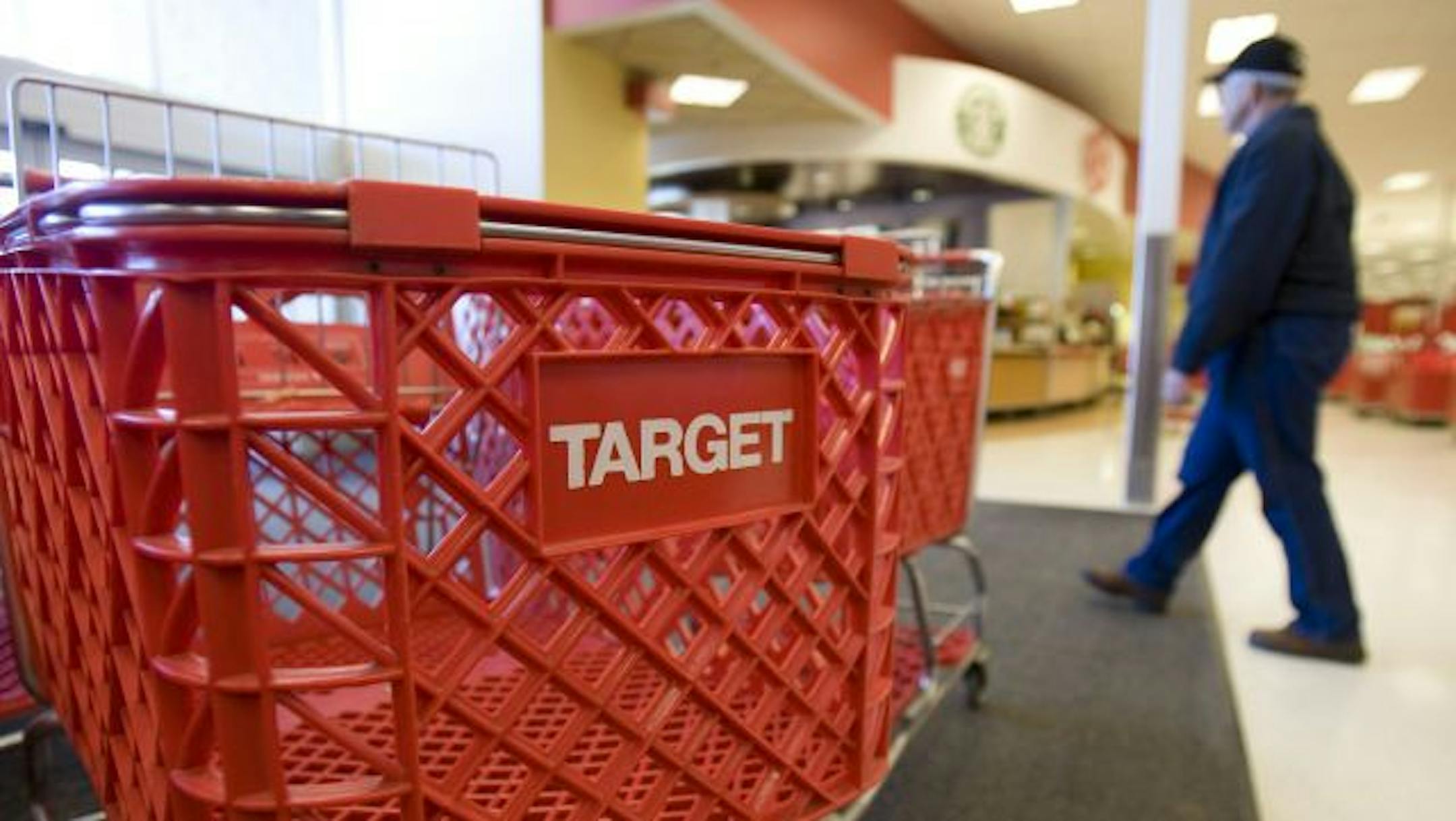 A shopper leaves the local Target store, Tuesday, Feb. 24, 2009, in Des Moines, Iowa.