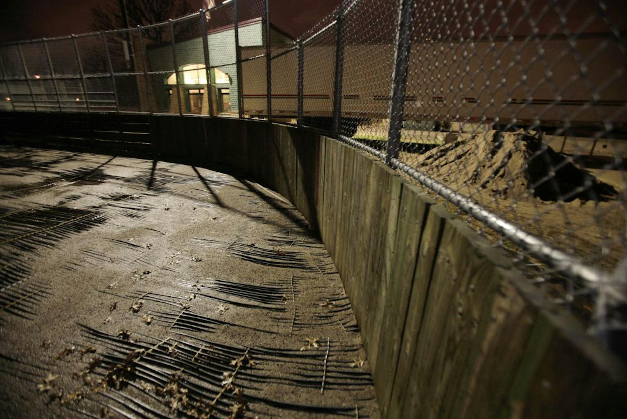 A pile of sand was left last month after thieves stole the copper tubes needed to create ice at the Phalen Recreation Center's outdoor skating rink in St Paul. The metal was worth only a few hundred dollars as scrap.