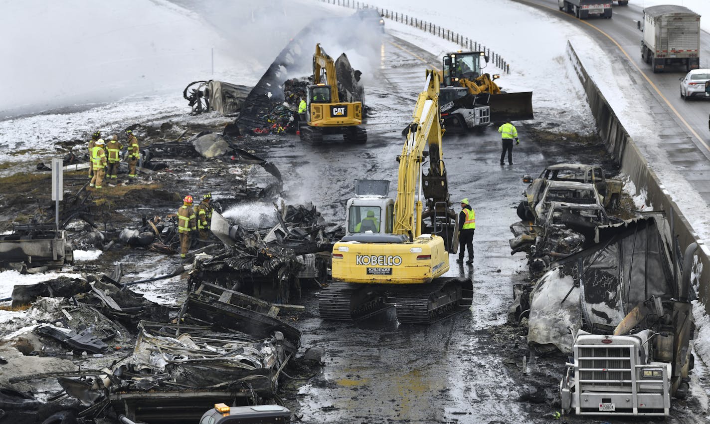 Crews removed vehicles and debris after a multivehicle crash and fires Thursday in the westbound lanes of Intertate 94 near Monticello. Nine people were transported with injuries.