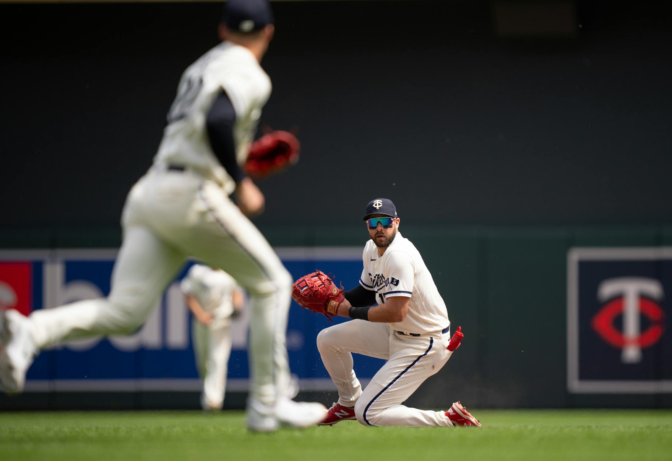 Minnesota Twins first baseman Joey Gallo (13) looked to throw to Minnesota Twins relief pitcher Griffin Jax (22) after fielding a sixth inning grounder by Toronto Blue Jays shortstop Bo Bichette for an out.