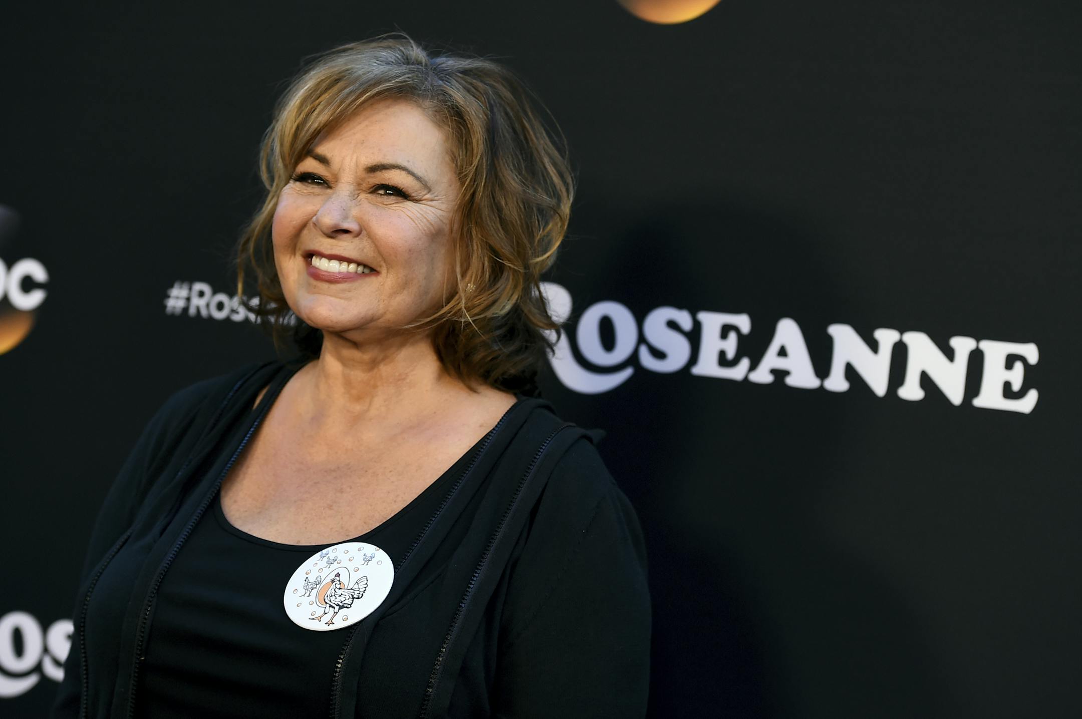 FILE - In this March 23, 2018, file photo, Roseanne Barr arrives at the Los Angeles premiere of "Roseanne."