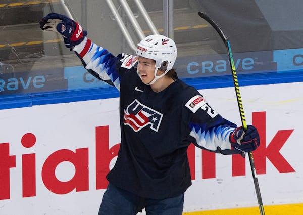 United States' Ryan Johnson celebrates his goal against Sweden during the second period of an IIHF World Junior Hockey Championship game Thursday, Dec