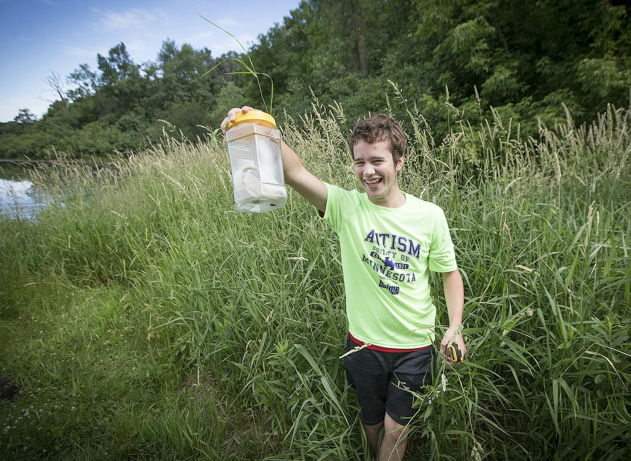 Josh Baker was more than excited to show that he had found a container of tape during a geocaching hike at the Lowry Nature Center during an outdoor adventure skills camp for autistic children, Wednesday, June 21, 2017 in Victoria, MN. The growing program by Three Rivers Park District is the only of its kind in the Twin Cities and partners with the Autism Society of Minnesota to teach the kids social skills lessons as well. ] ELIZABETH FLORES ï liz.flores@startribune.com