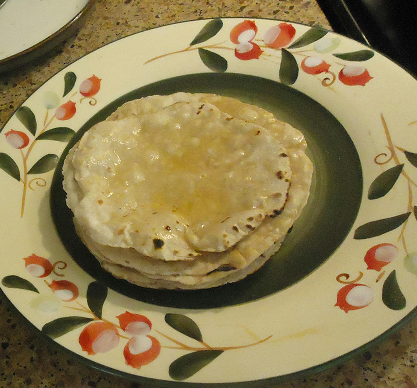 The Indian flatbread roti is often served with ghee, or clarified butter.