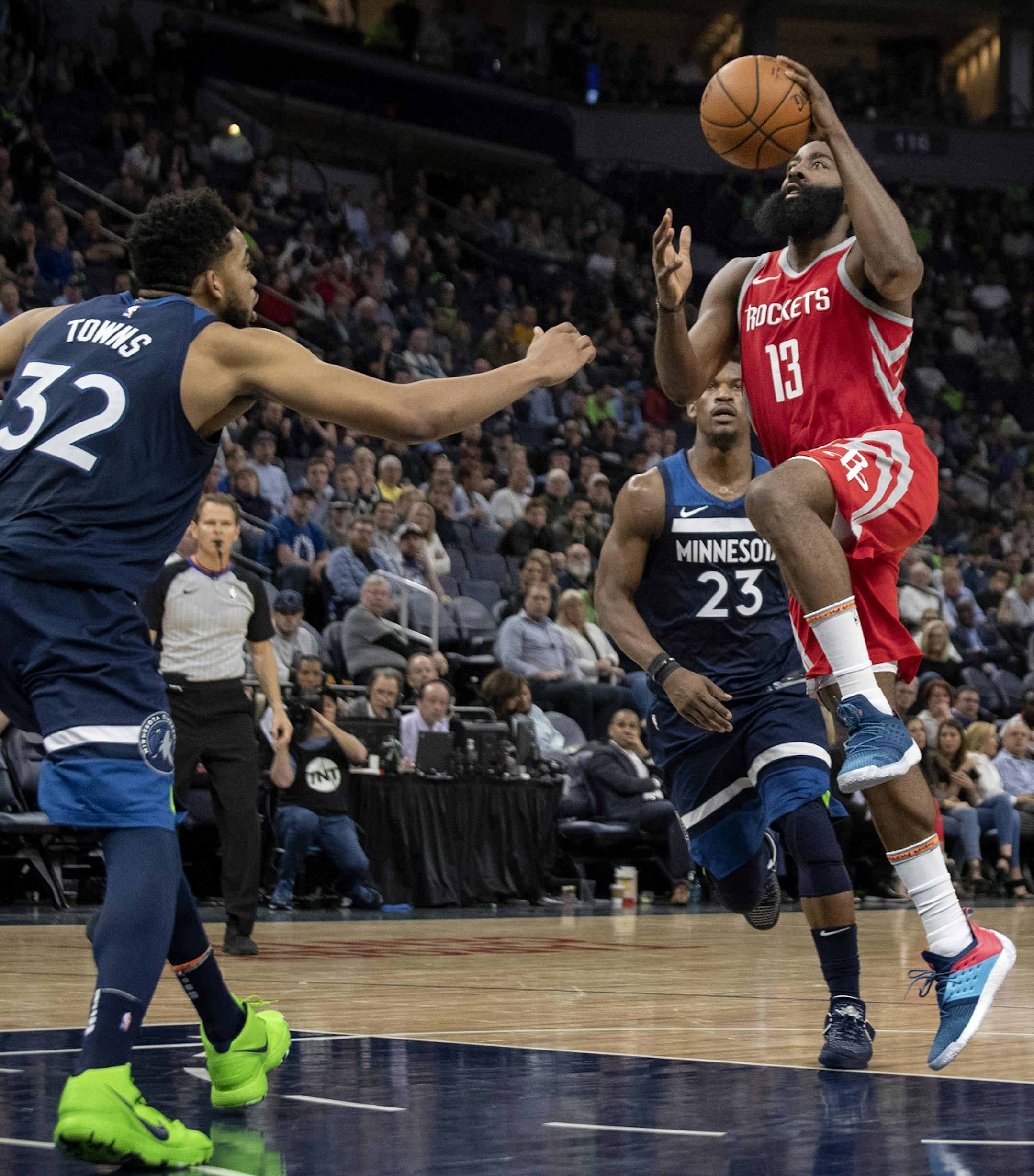 James Harden (13) drove to the basket in the fourth quarter.