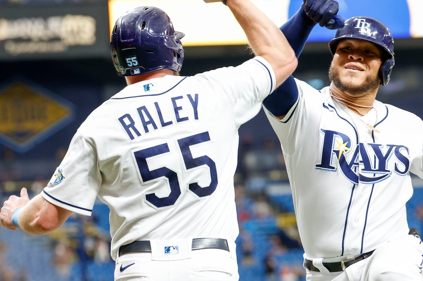 Tampa Bay Rays first baseman Luke Raley (55), left, and designated hitter Harold Ramirez (43), right, celebrate a two-run home run in the fourth inning against the Minnesota Twins Thursday, June 8, 2023, at Tropicana Field in St. Petersburg, Florida. (Ivy Ceballo/Tampa Bay Times/TNS) ORG XMIT: 81570390W