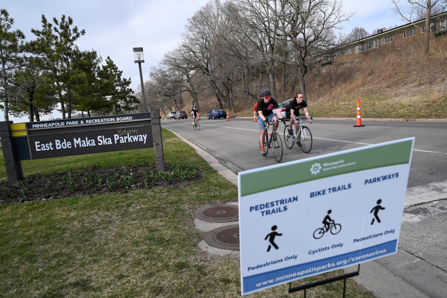 Cyclists made their way around East Bde Maka Ska Parkway on April 22. Data from the Minnesota Department of Transportation show a 51% increase in walking and bicycling in the metro area over the past five weeks.