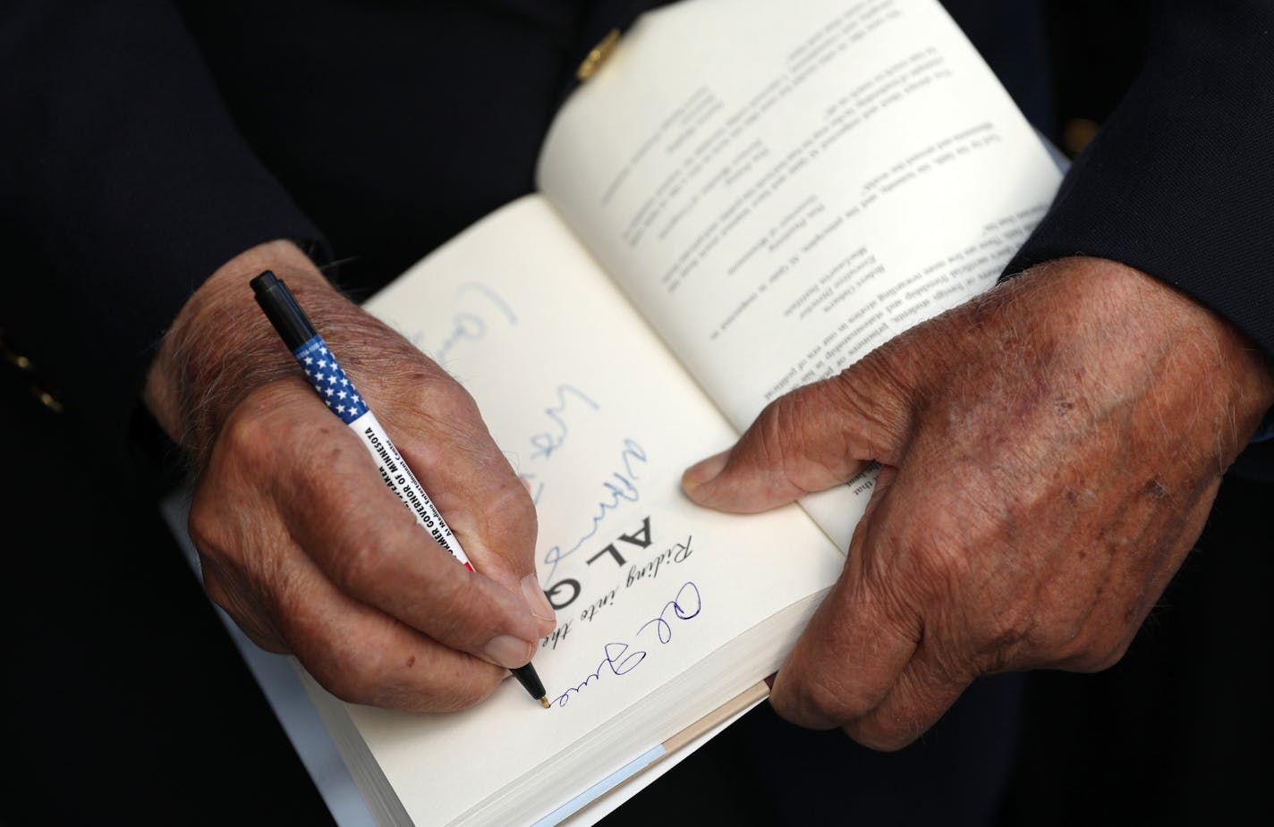 Former Gov. Al Quie signed a copy of his book for Nancy Rand prior to the dedication of the first building to be named in his honor, the education center at Norway House, Friday. ] ANTHONY SOUFFLE &#xef; anthony.souffle@startribune.com Former Gov. Al Quie was on hand for the dedication of the first building to be named in his honor, the education center at Norway House Friday, Sept. 29, 2017 in Minneapolis. Quie was gov from 1979-1983.