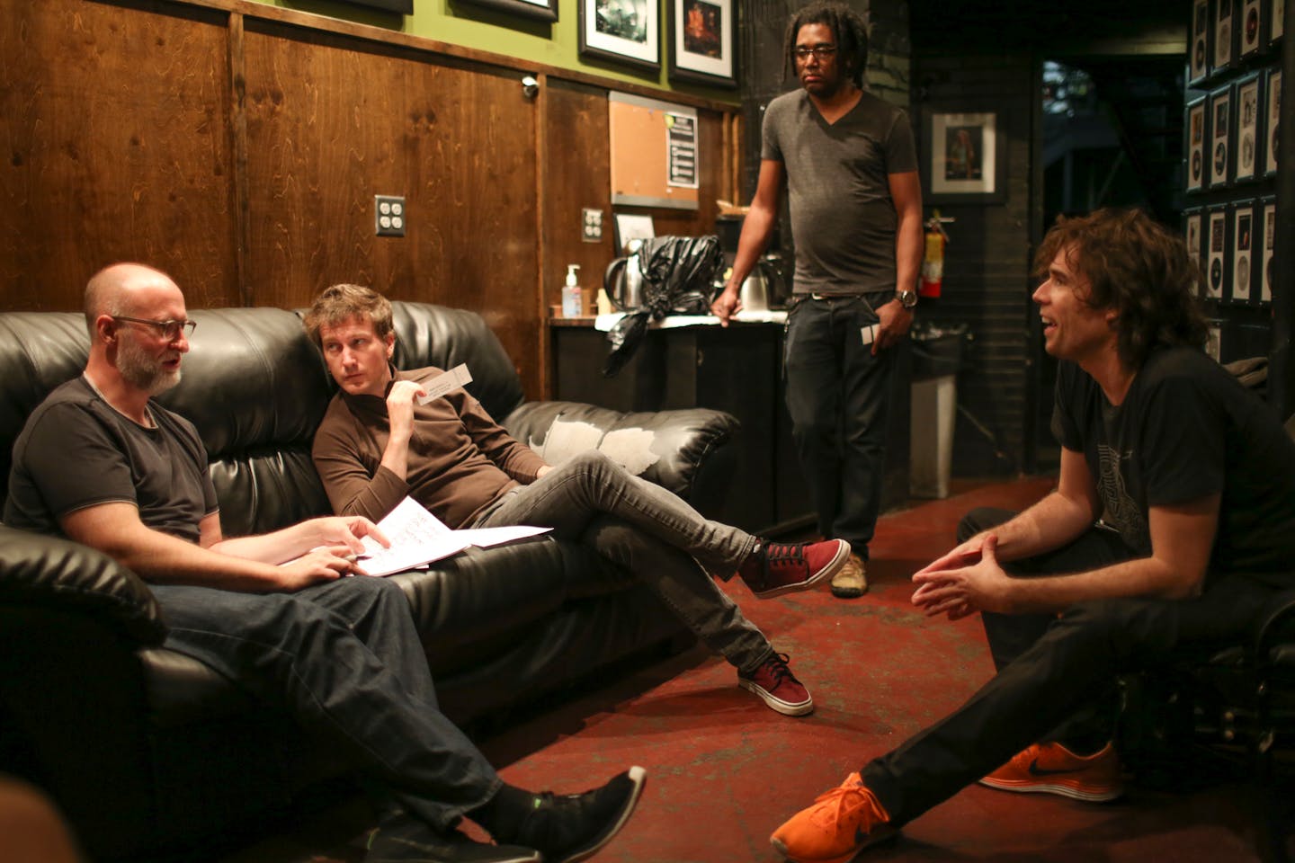 In the green room at First Ave. Bob Mould, left, worked out the set list for the night's show in the 7th St. Entry with bassist Jason Narducy, next to him on the couch, and drummer Jon Wurster, right.