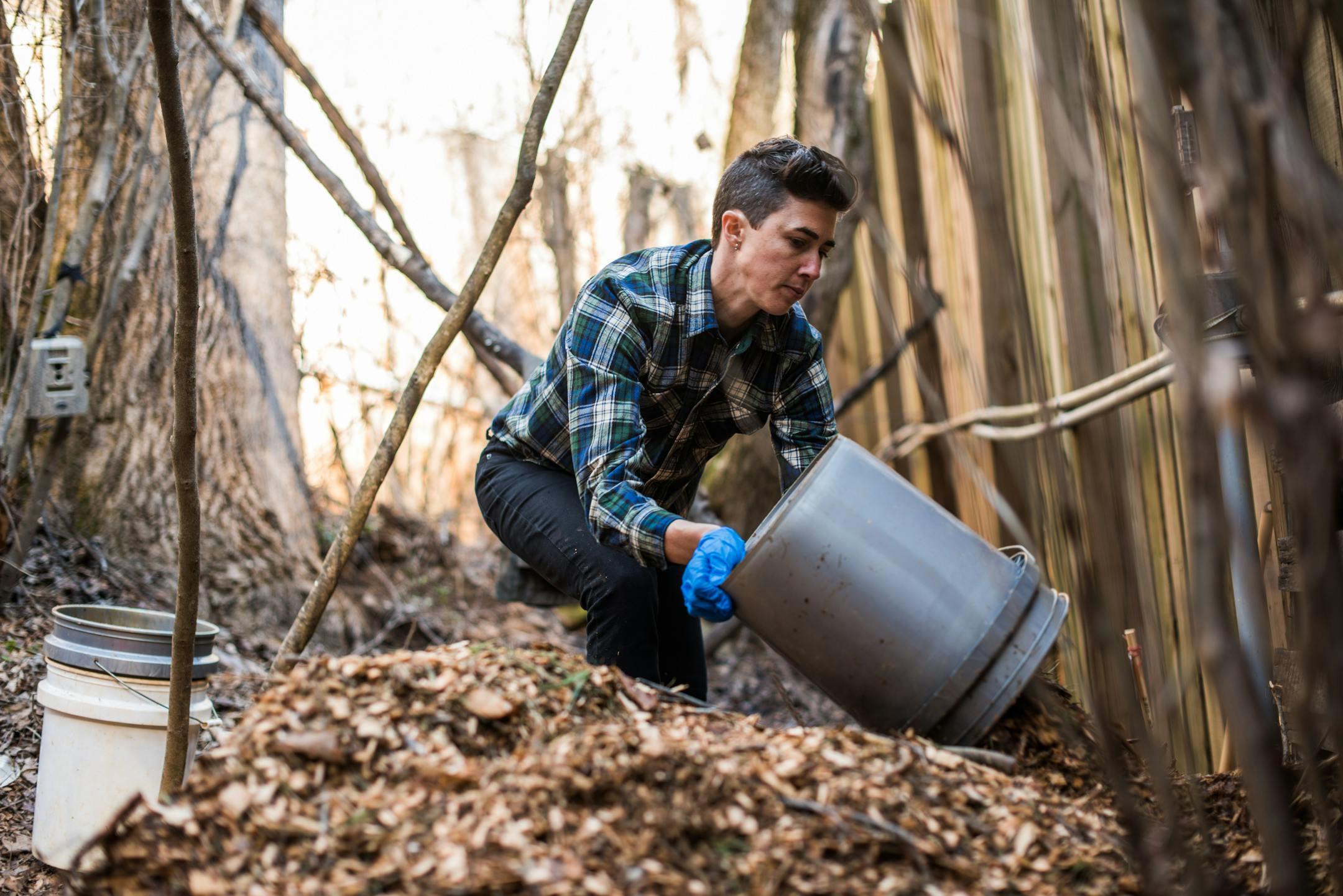 FILE — Katrina Spade, the co-founder and chief executive of Recompose, monitoring the temperature of a mound of wood chips that contains a human body at Western Carolina University's human decomposition facility in Collowhee, N.C., on March 7, 2015. The Colorado state Legislature passed a bill on Tuesday, April 27, 2021, that would allow composting of human remains in lieu of traditional processes like burial and cremation. (Mike Belleme/The New York Times)